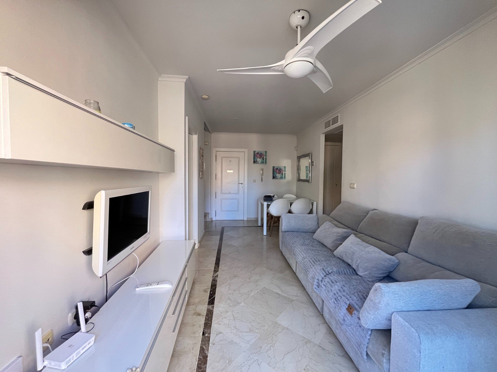 Modern apartment close to the beach with 2 bedrooms, 2 bathrooms, 2 terraces, underground parking space and communal pool