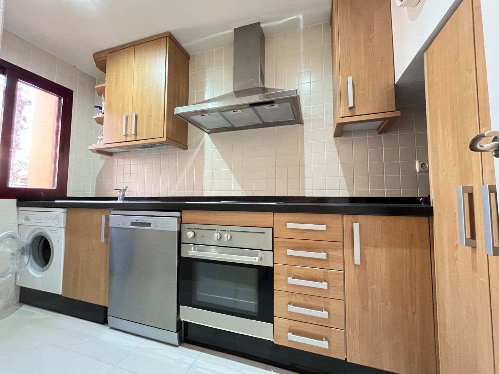 Modern apartment close to the beach with 2 bedrooms, 2 bathrooms, 2 terraces, underground parking space and communal pool