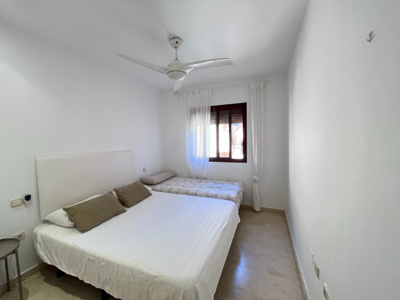 Modern apartment close to the beach with 2 bedrooms, 2 bathrooms, 2 terraces, underground parking space and communal pool