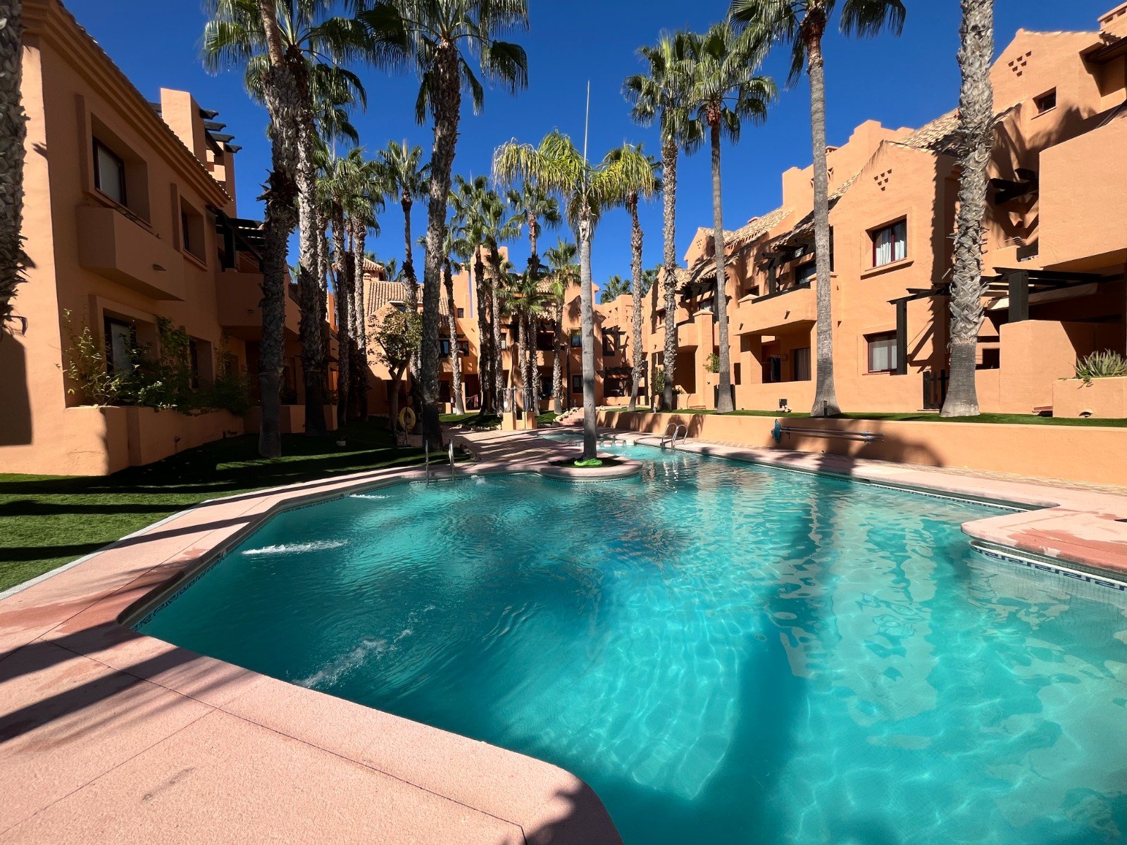 Modern apartment close to the beach with 2 bedrooms, 2 bathrooms, 2 terraces, underground parking space and communal pool