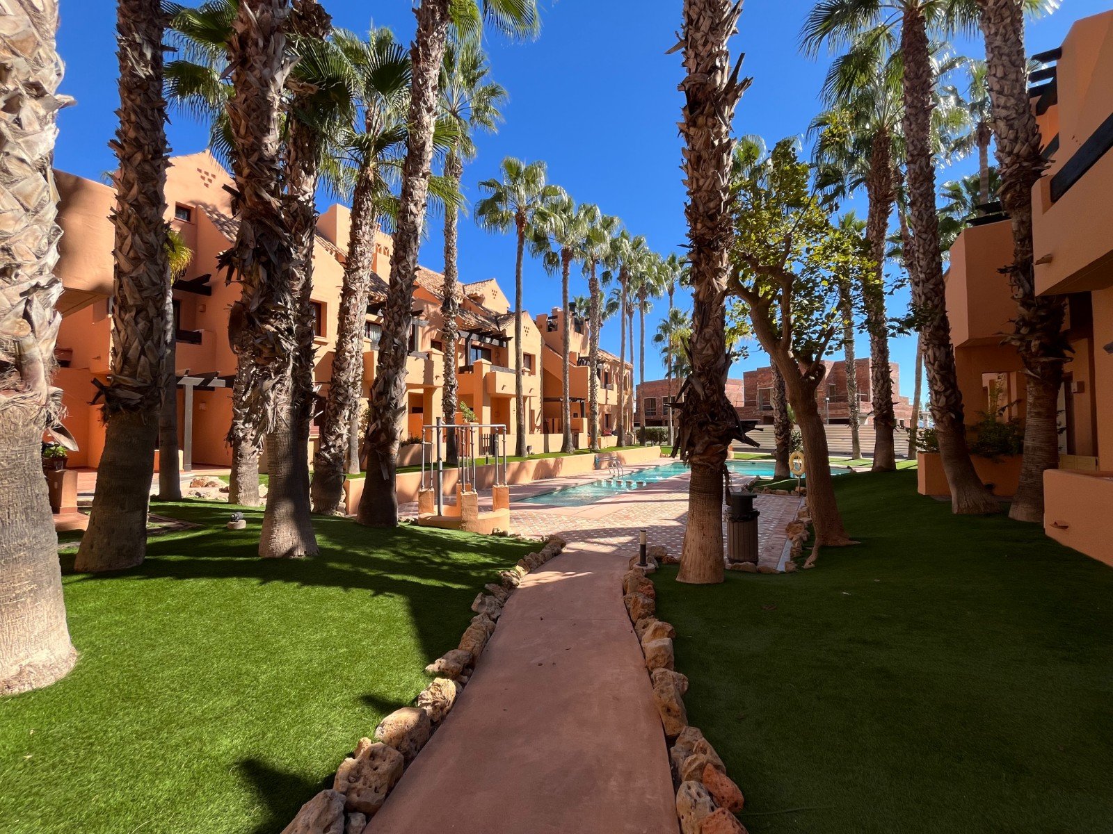 Modern apartment close to the beach with 2 bedrooms, 2 bathrooms, 2 terraces, underground parking space and communal pool