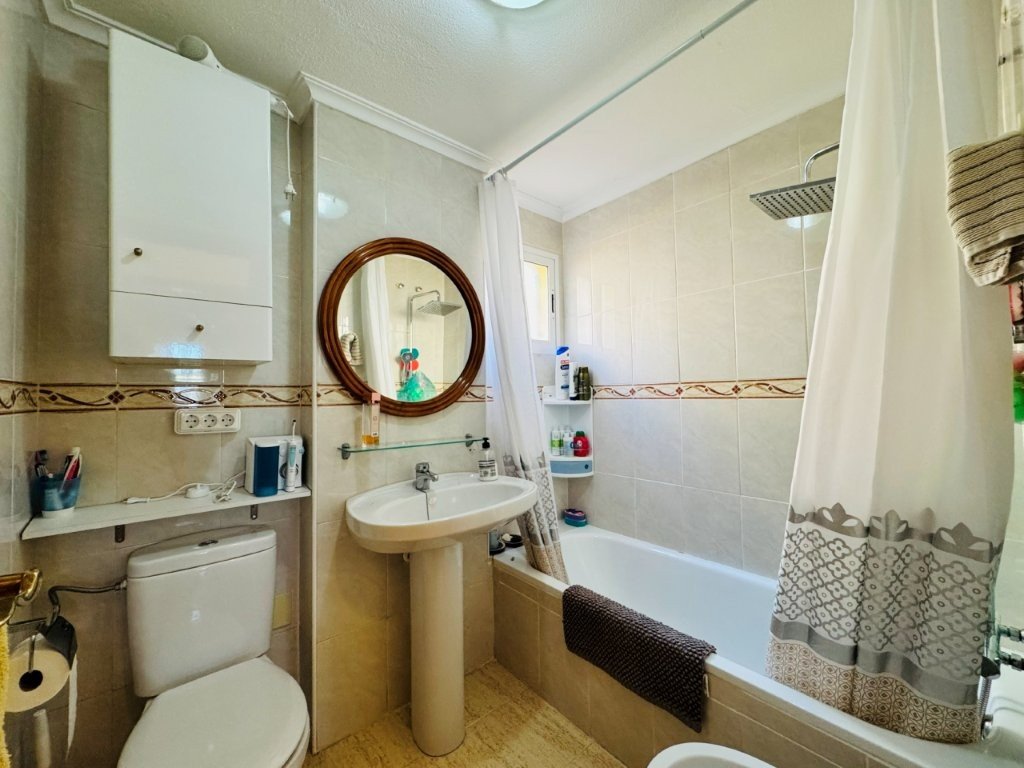 Ground floor apartment with 2 bedrooms, 1 bathroom, private pool and large terrace just 600 metres from the beach