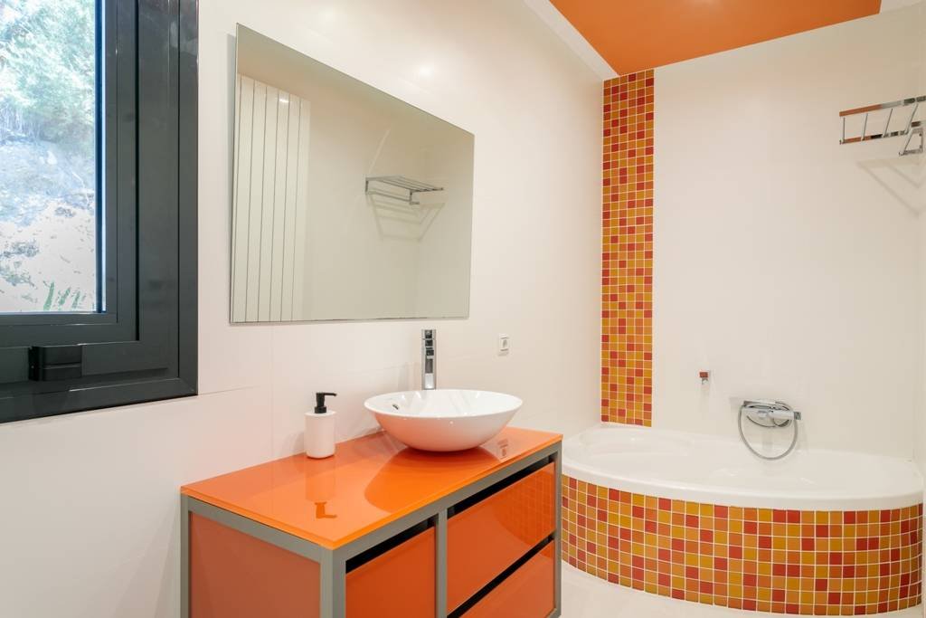 Modern villa with heated pool and spectacular panoramic views of the coast and sea, with rental licence