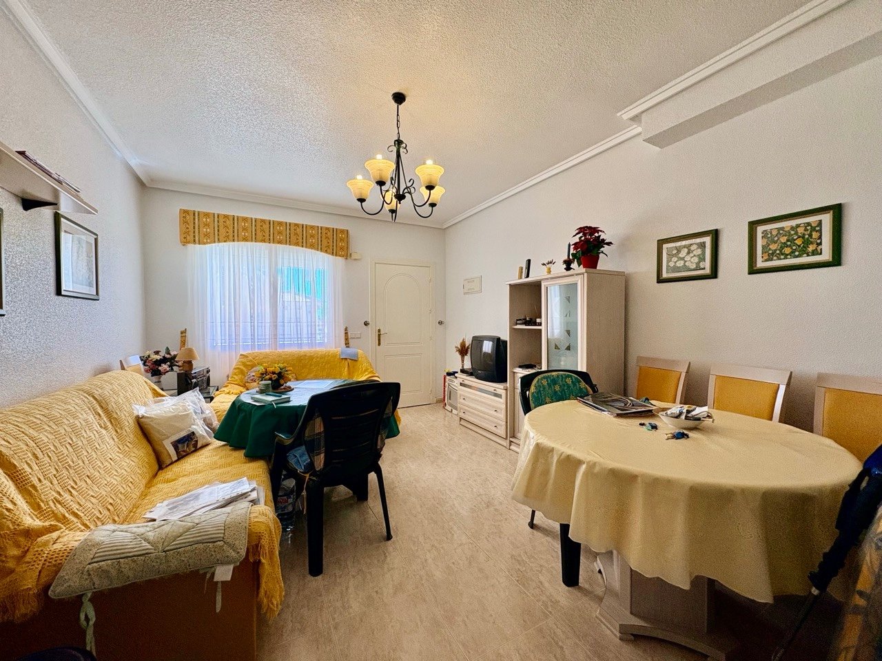 Two-bedroom terraced house with one bathroom, a guest toilet and a communal swimming pool in the La Fiesta II residential complex