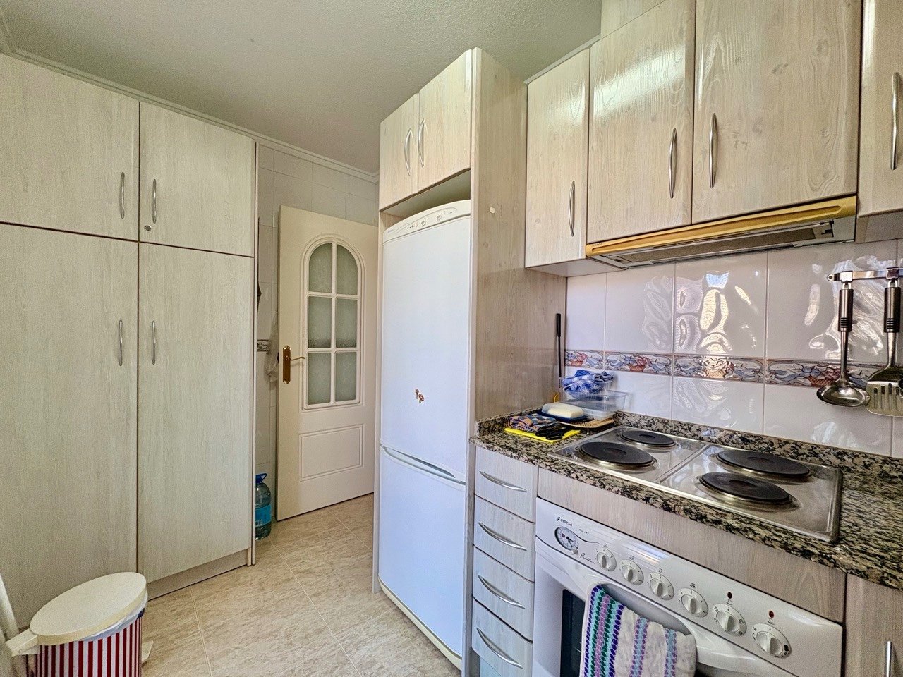 Two-bedroom terraced house with one bathroom, a guest toilet and a communal swimming pool in the La Fiesta II residential complex