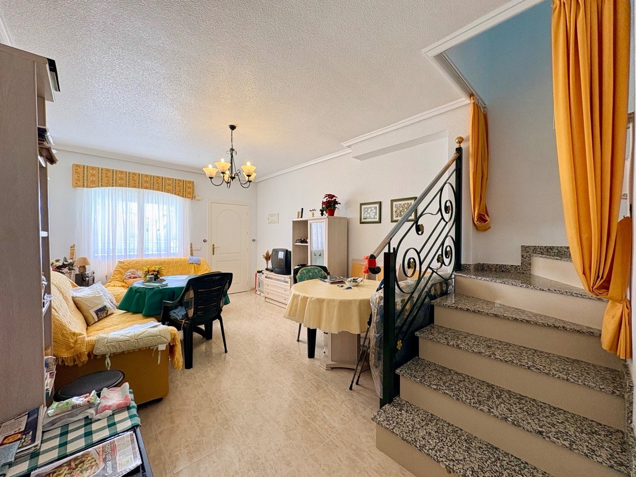 Two-bedroom terraced house with one bathroom, a guest toilet and a communal swimming pool in the La Fiesta II residential complex