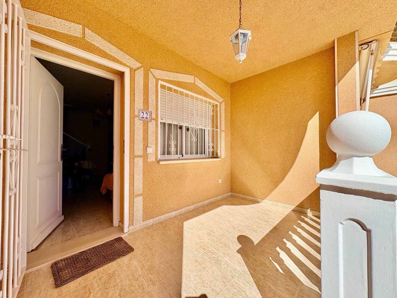 Two-bedroom terraced house with one bathroom, a guest toilet and a communal swimming pool in the La Fiesta II residential complex