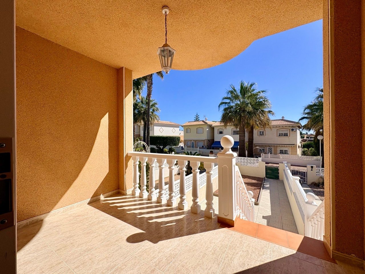 Two-bedroom terraced house with one bathroom, a guest toilet and a communal swimming pool in the La Fiesta II residential complex