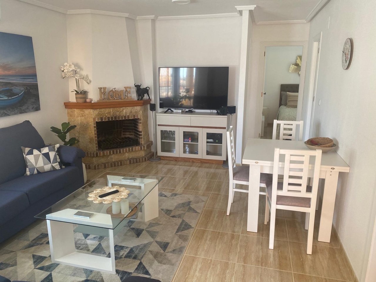 Detached villa with two residential units, a carport and a communal pool in a prime location