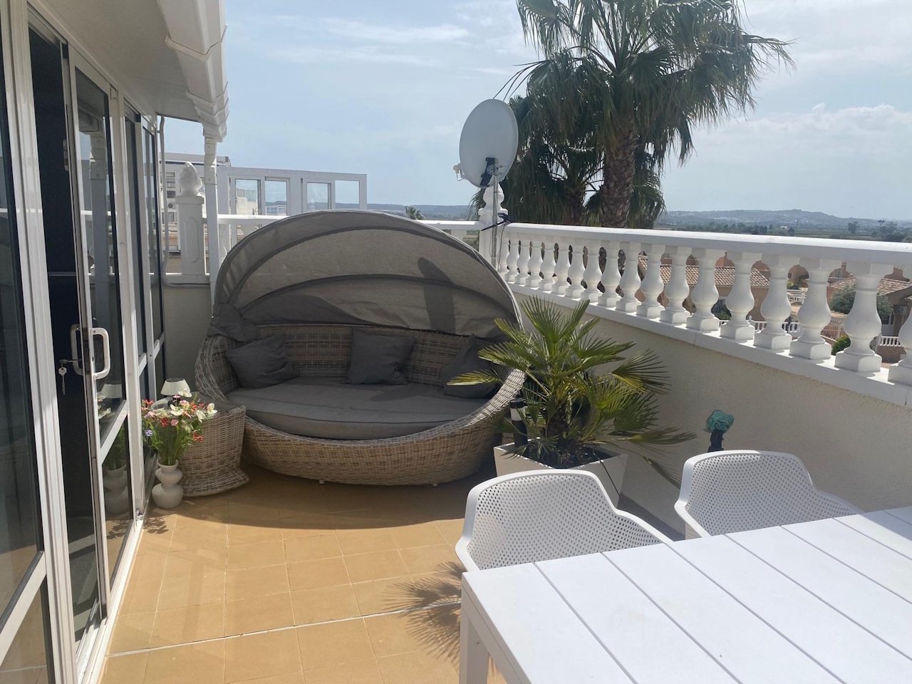 Detached villa with two residential units, a carport and a communal pool in a prime location