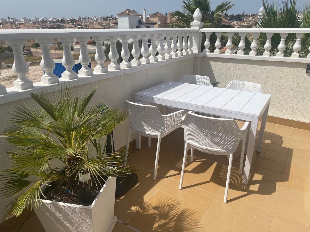 Detached villa with two residential units, a carport and a communal pool in a prime location
