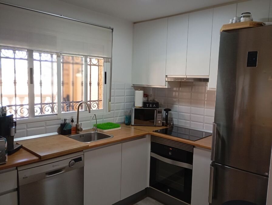 Terraced house with 2 bedrooms, 2 bathrooms, a guest toilet, a roof terrace, an underground parking space and a communal swimming pool