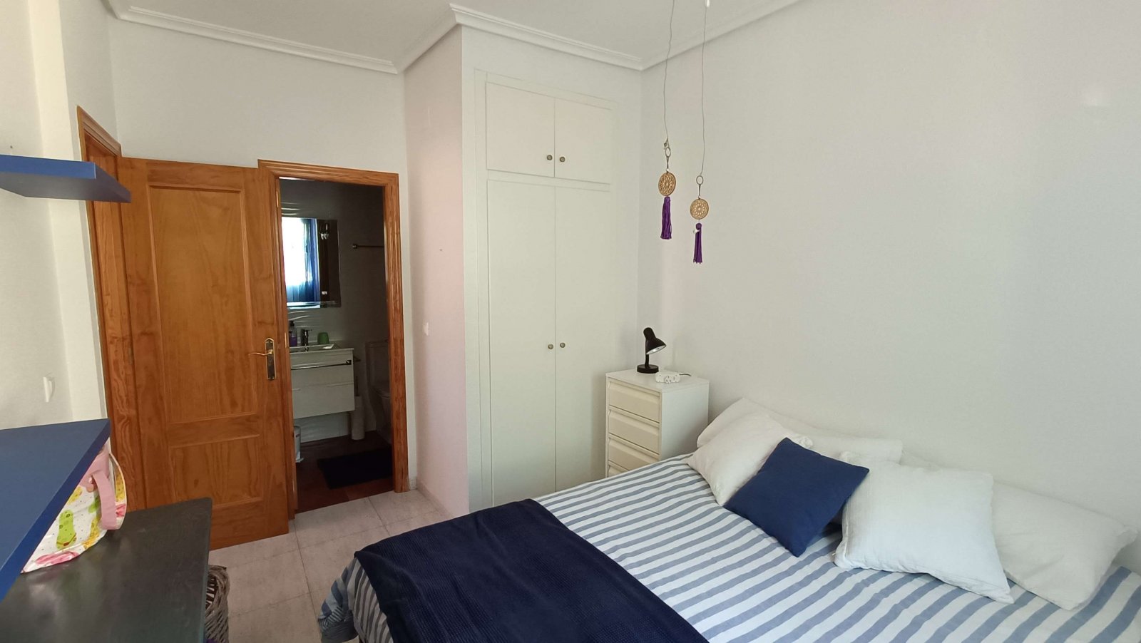 Beautiful quad with 2 bedrooms, 2 bathrooms, a guest area in the basement, a roof terrace and a communal swimming pool