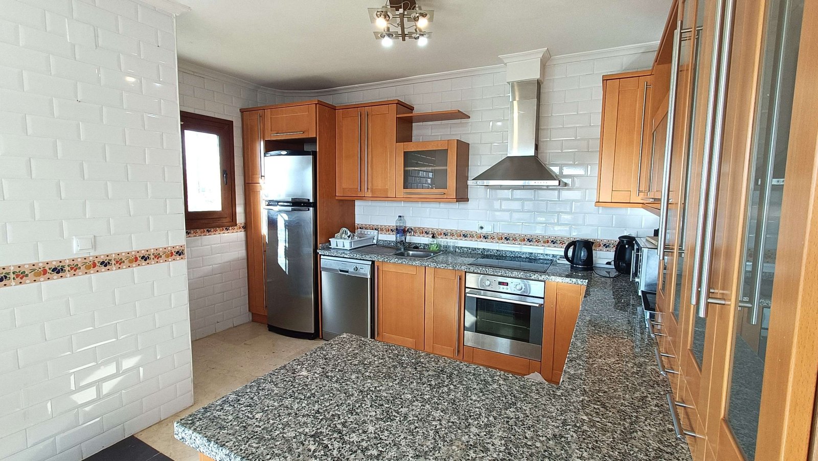 3-bedroom villa with 2 bathrooms, a parking space and a communal swimming pool at La Finca Golf Resort