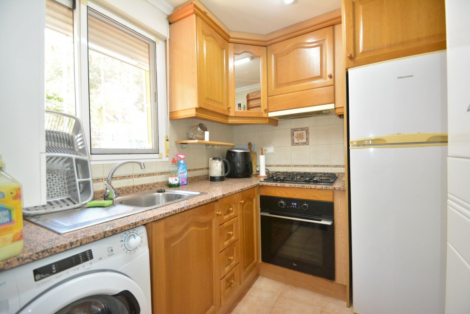 Semi-detached villa with 2 bedrooms, 2 bathrooms, garage and communal pool