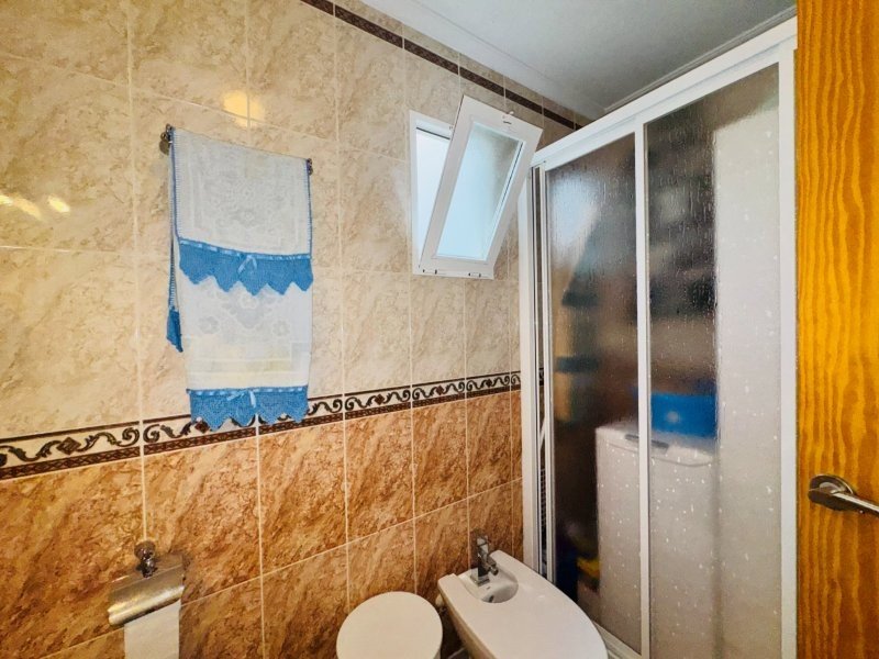 Apartment with 2 bedrooms, 2 bathrooms and an underground parking space just 200 metres from the beach