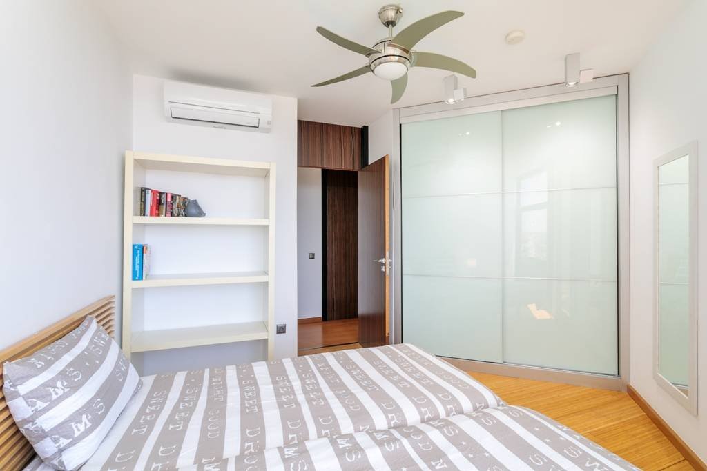 Modern villa with heated pool and spectacular panoramic views of the coast and sea, with rental licence
