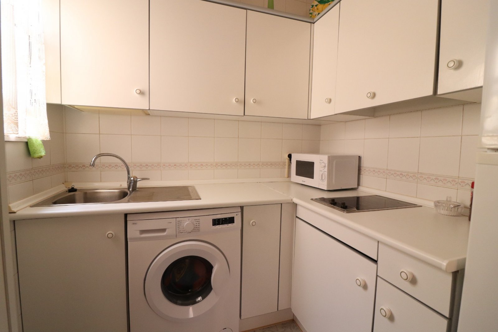 Apartamento de dos dormitorios en planta alta con piscina comunitaria