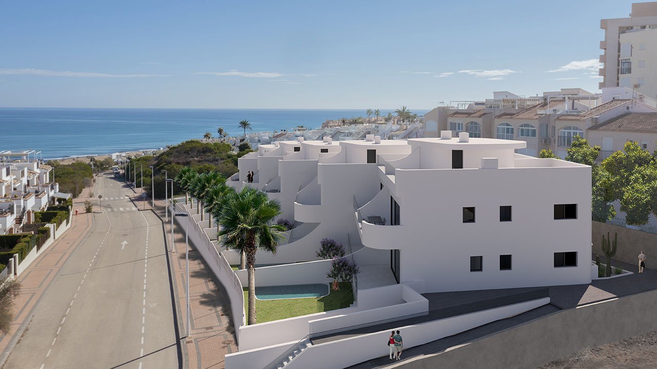 Bungalows bajos de 2 dormitorios y 2 baños con aire acondicionado, vistas al mar y piscina comunitaria a tan solo 300 m del mar