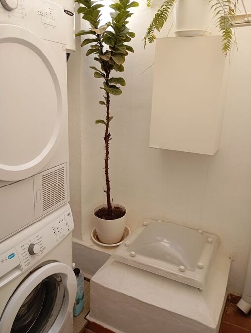 Vivienda adosada con 2 dormitorios, 2 baños, aseo de invitados, solárium, plaza de garaje subterráneo y piscina comunitaria