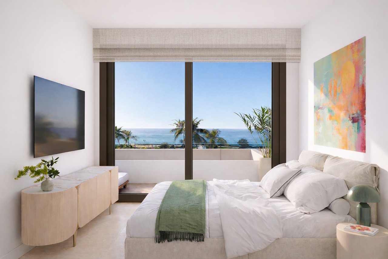 Adosados de 3 dormitorios y 2 baños con aseo, sótano/garaje, vistas al mar y piscina comunitaria en un complejo exclusivo en primera línea