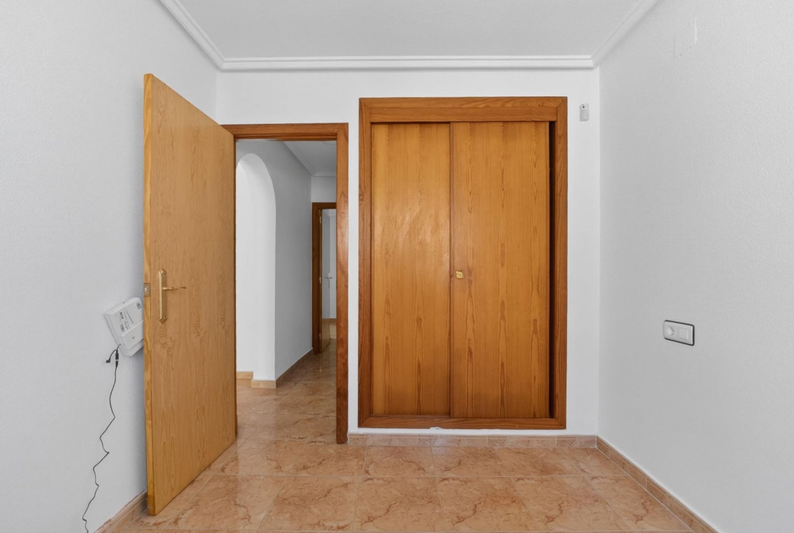 Planta baja de 2 dormitorios con terraza, patio y piscina comunitaria