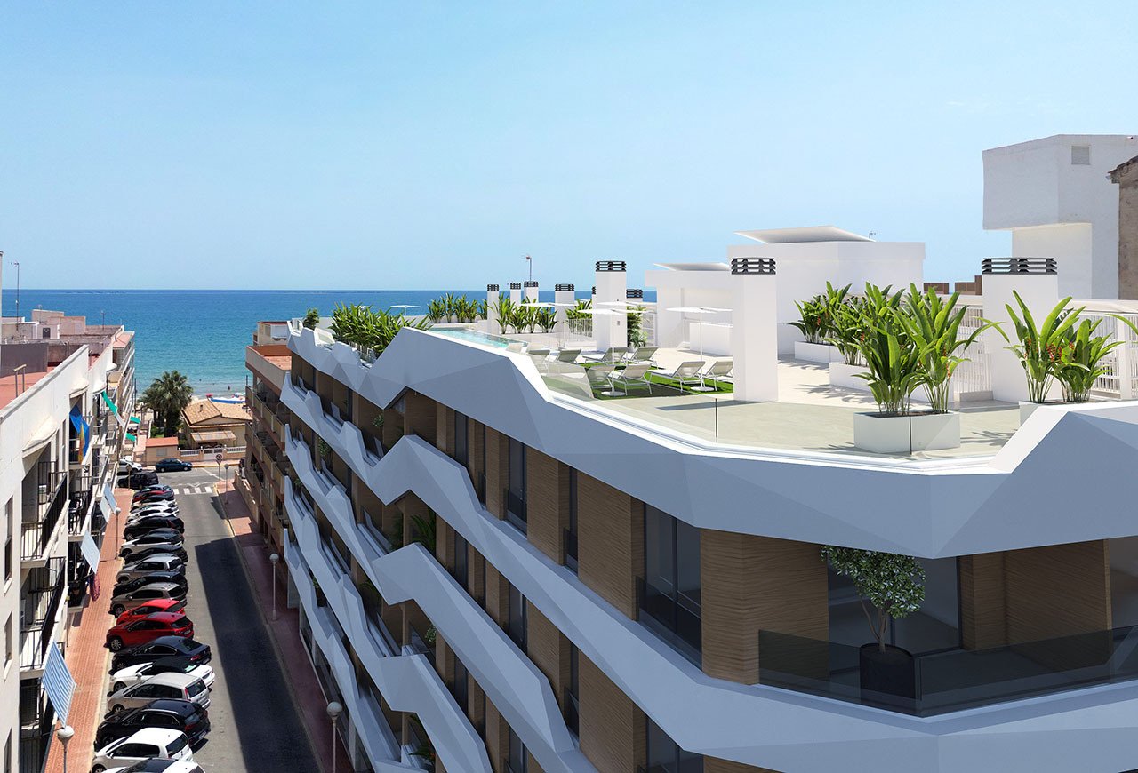 Apartamentos de 3 dormitorios y 2 baños con aire acondicionado, parking privado opcional y piscina comunitaria a tan sólo 100 m de la playa