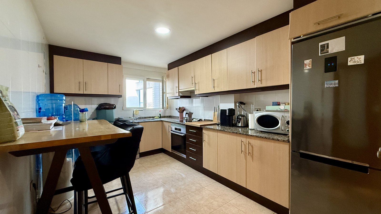 Appartement avec 3 chambres, place de parking et débarras