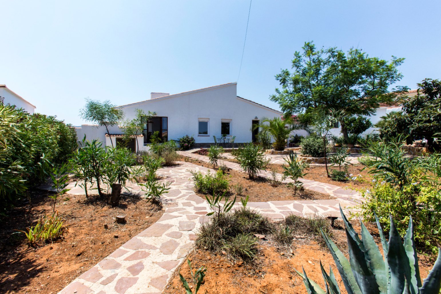Villa à Monte Pedreguer avec vue sur la mer, logement pour les invités, quatre chambres, terrain plat, terrasse sur le toit et espace pour une piscine