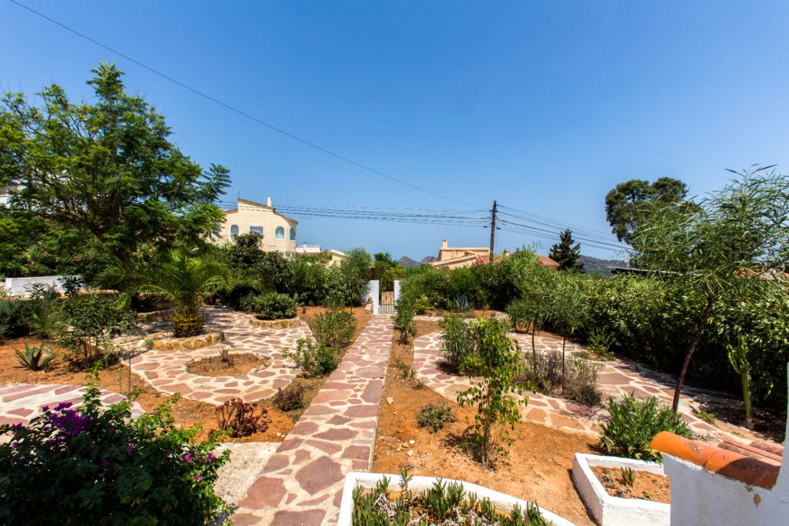 Villa à Monte Pedreguer avec vue sur la mer, logement pour les invités, quatre chambres, terrain plat, terrasse sur le toit et espace pour une piscine